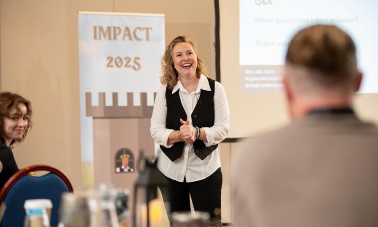Eve Molzhon, Dog Handler Academy founder, delivering the keynote speaking session at IMPACT 2025 in Sunderland, United Kingdom.